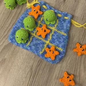 pochette en crochet fait main avec pieuvre et étoile, thème fond marin