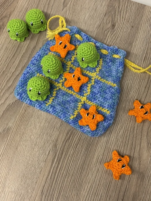 pochette en crochet fait main avec pieuvre et étoile, thème fond marin