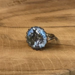 Bague fantaisie cabochon bleu pâle pailleté
